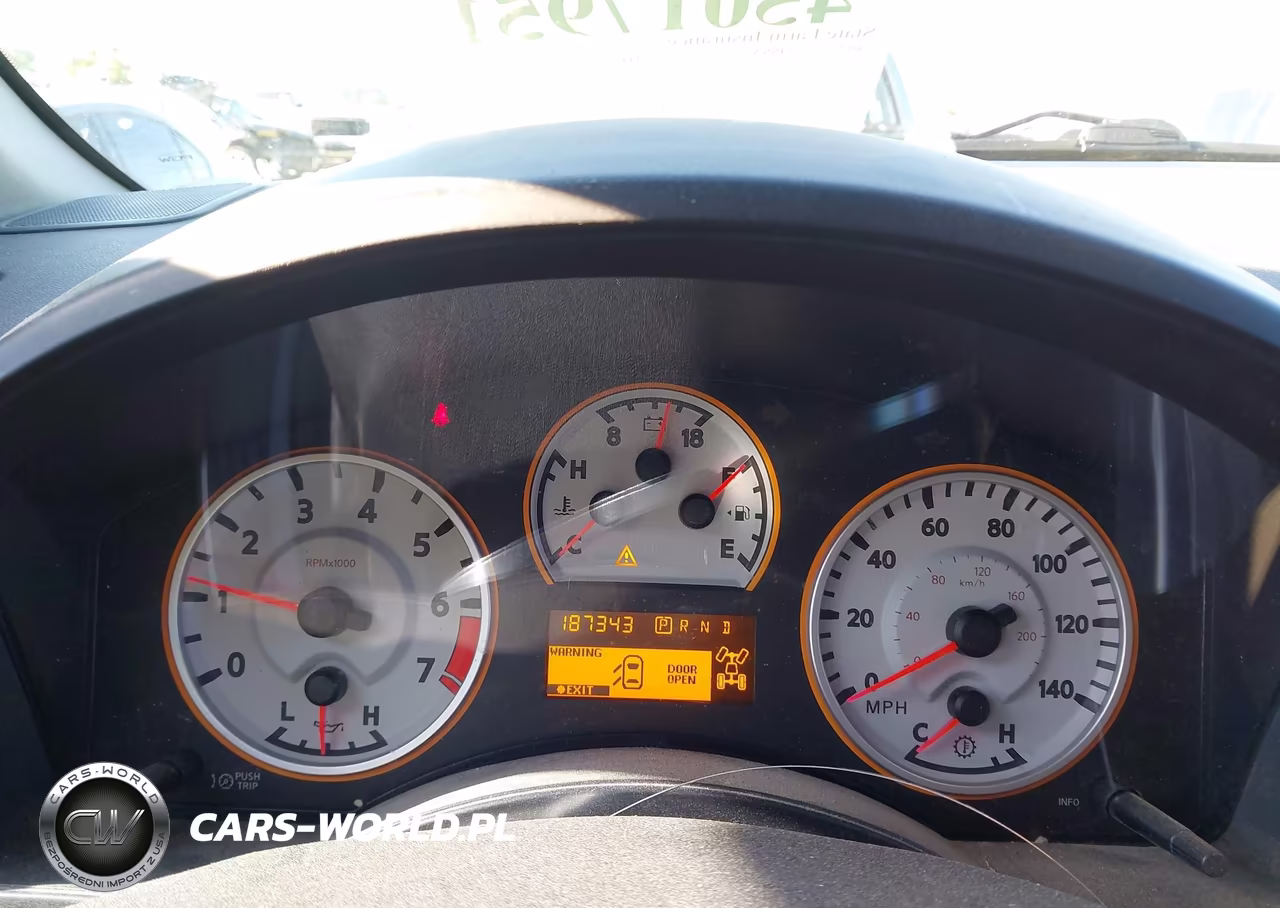 2012 Nissan Titan Pro-4X VIN:1N6BA0EC4CN323352 - 7