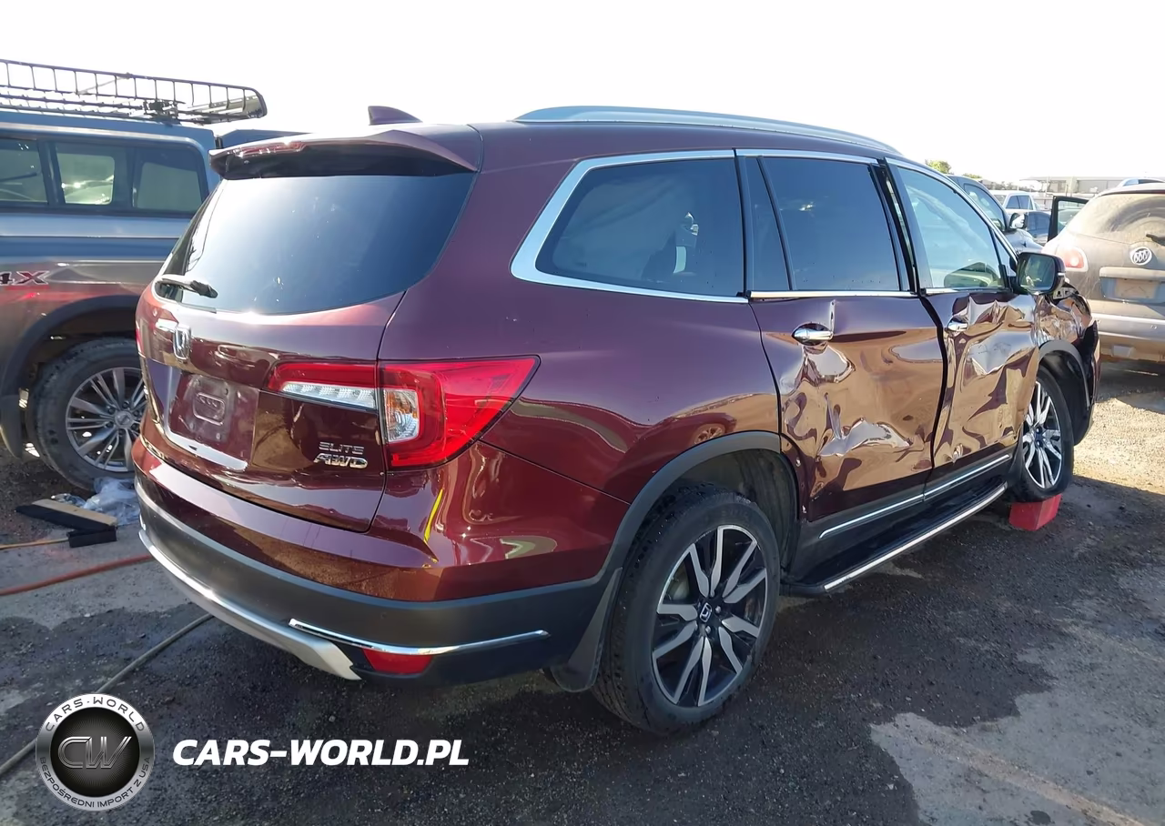 2019 Honda Pilot Elite VIN:5FNYF6H06KB092857 - 4