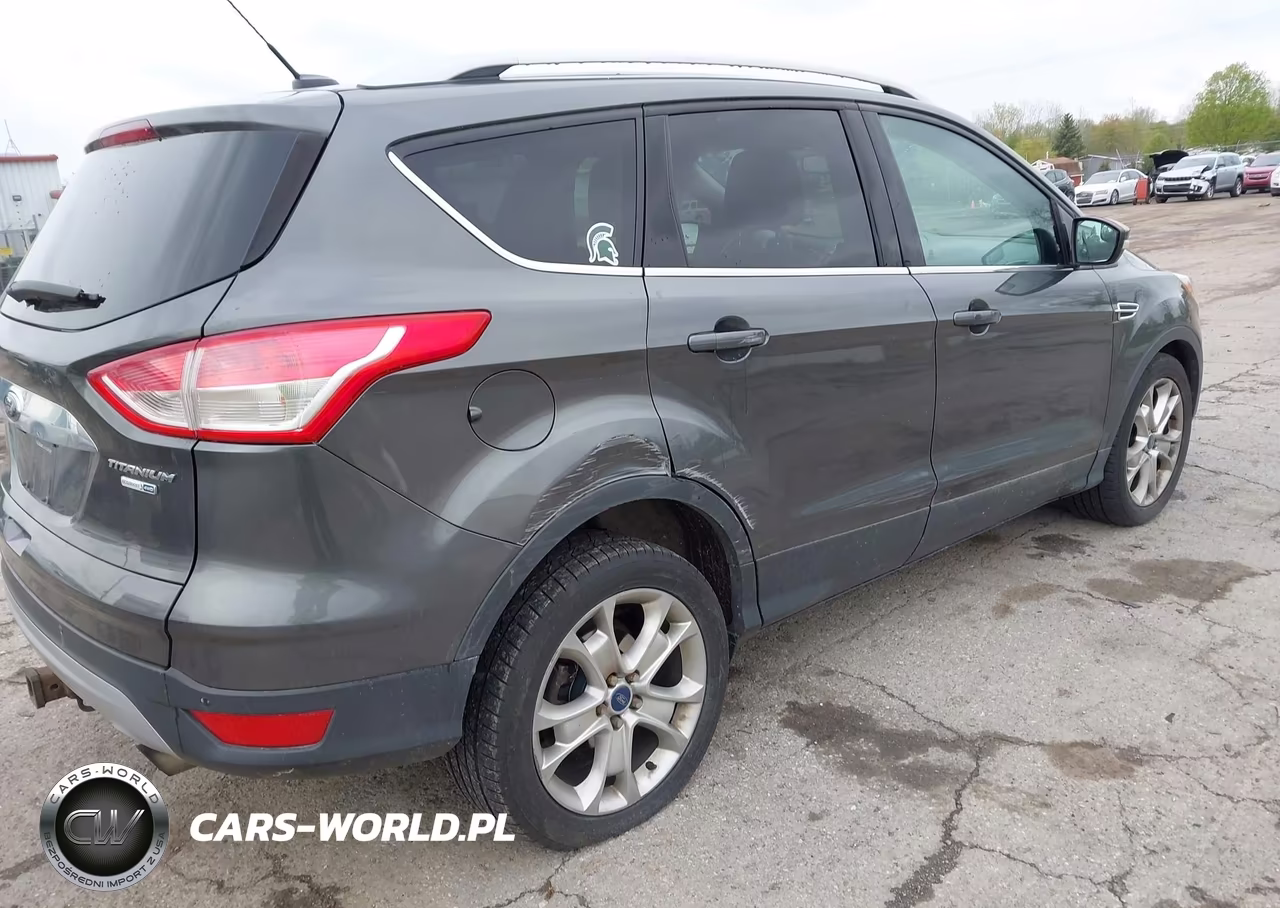 2016 Ford Escape Titanium VIN:1FMCU9J94GUA50773 - 4