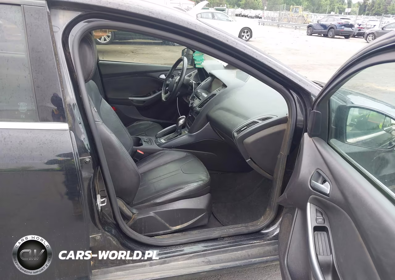 2014 Ford Focus Titanium VIN:1FADP3J25EL141656 - 5