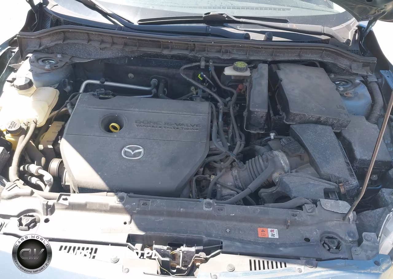 2010 Mazda Mazda3 I Touring VIN:JM1BL1SF7A1264724 - 10