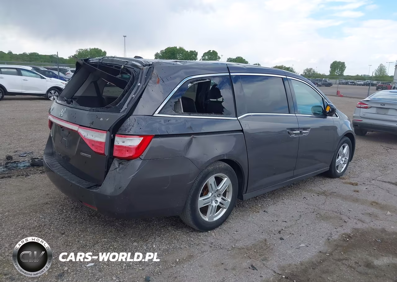 2012 Honda Odyssey Touring-Touring Elite VIN:5FNRL5H9XCB065281 - 4