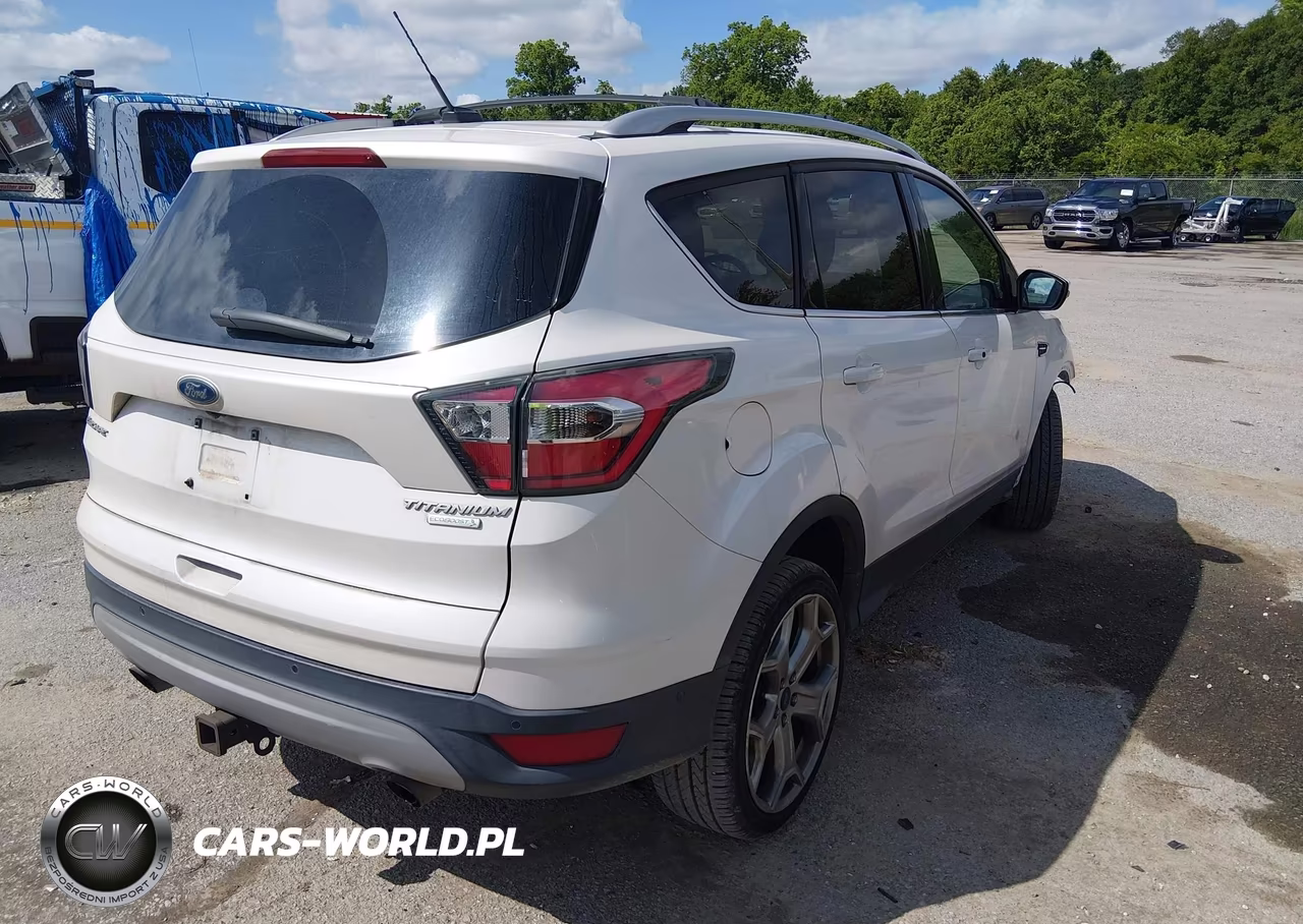 2017 Ford Escape Titanium VIN:1FMCU0J91HUA08851 - 4