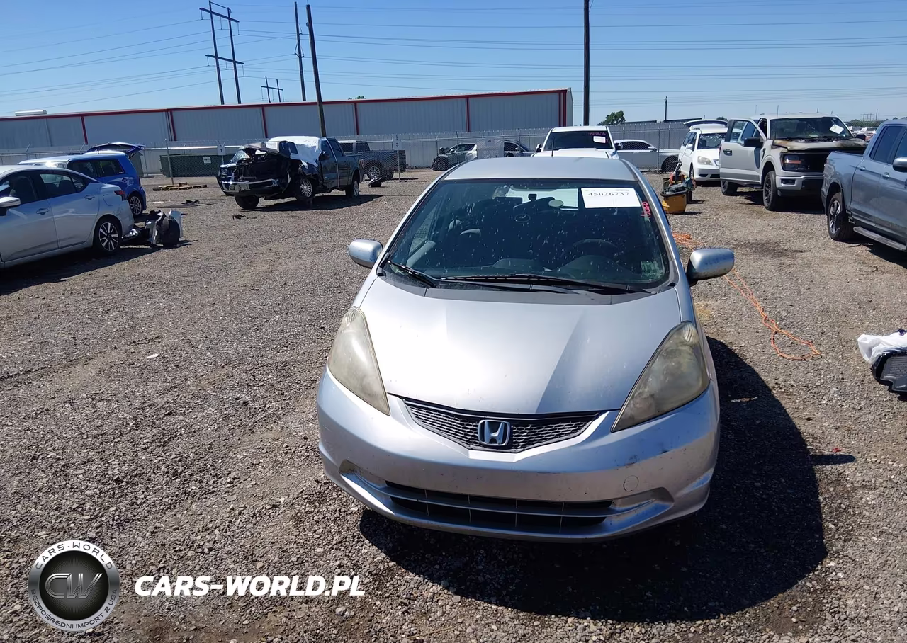 2013 Honda Fit VIN:JHMGE8H32DC013333 - 13