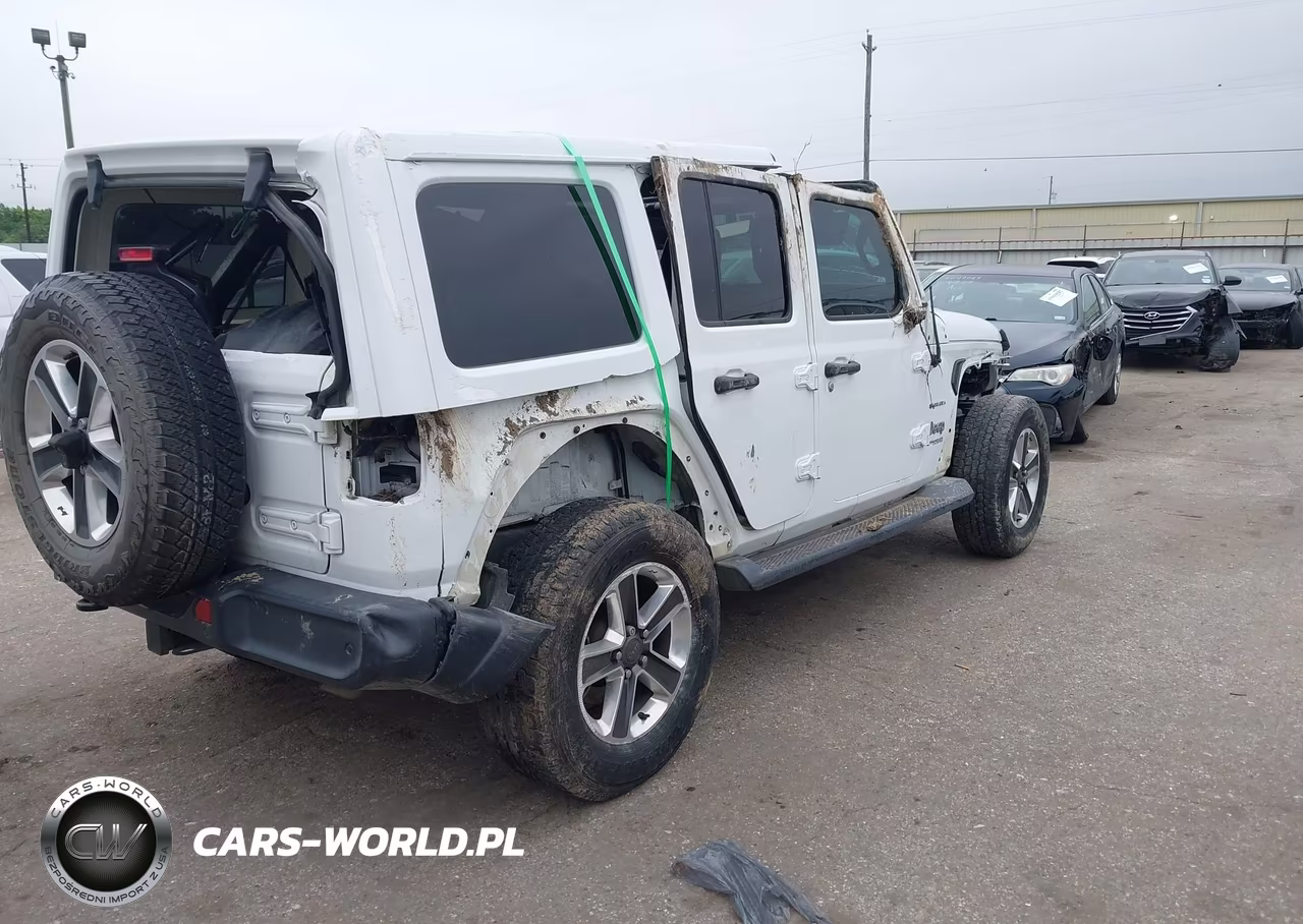2018 Jeep Wrangler Unlimited Sahara 4X4 VIN:1C4HJXEG0JW123715 - 4