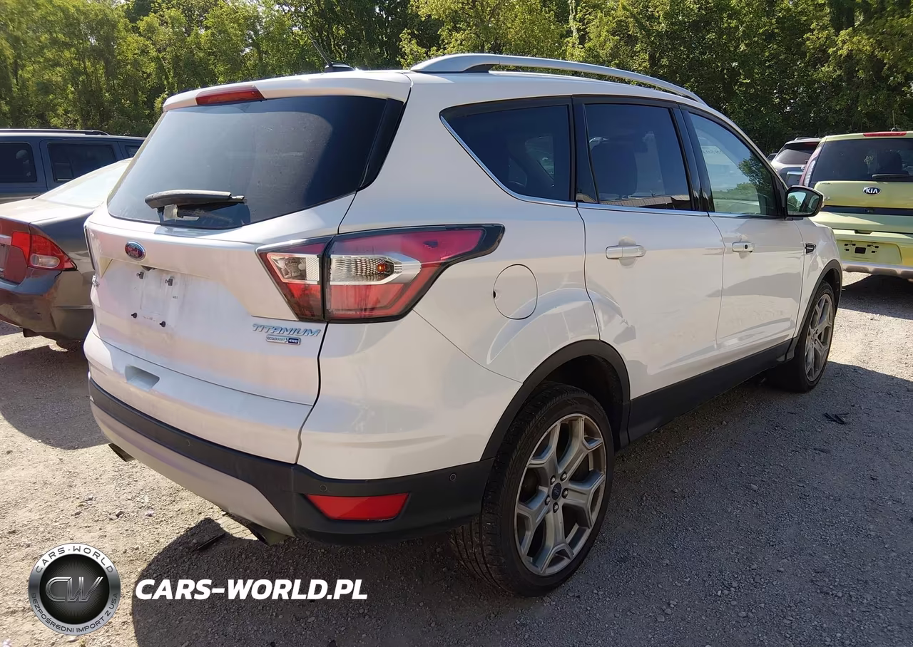 2017 Ford Escape Titanium VIN:1FMCU9J90HUA38718 - 4