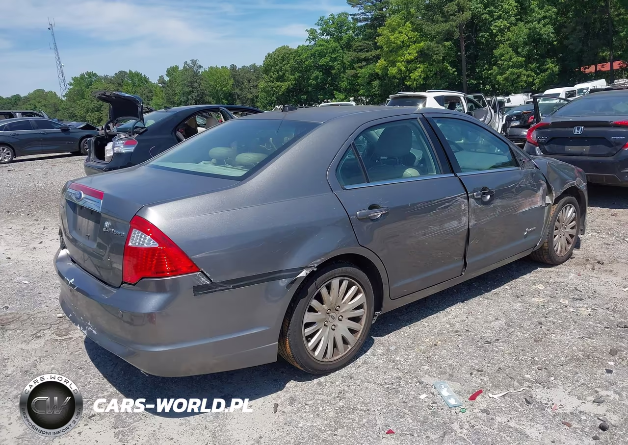 2010 Ford Fusion Hybrid VIN:3FADP0L3XAR344946 - 4