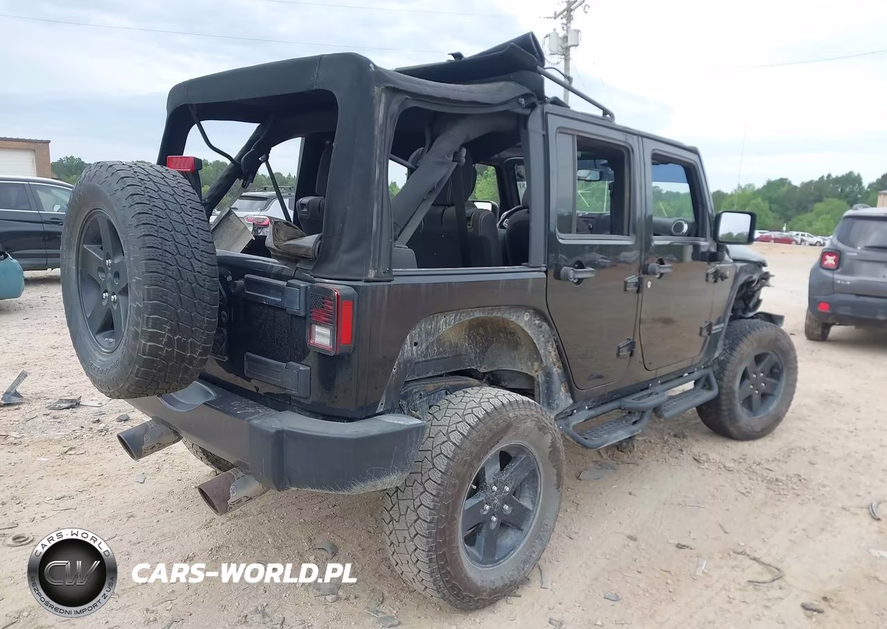 2015 Jeep Wrangler Unlimited Rubicon VIN:1C4BJWFG2FL642241 - 4