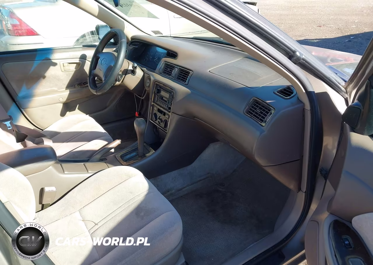 1999 Toyota Camry Le VIN:4T1BG22K7XU872852 - 5