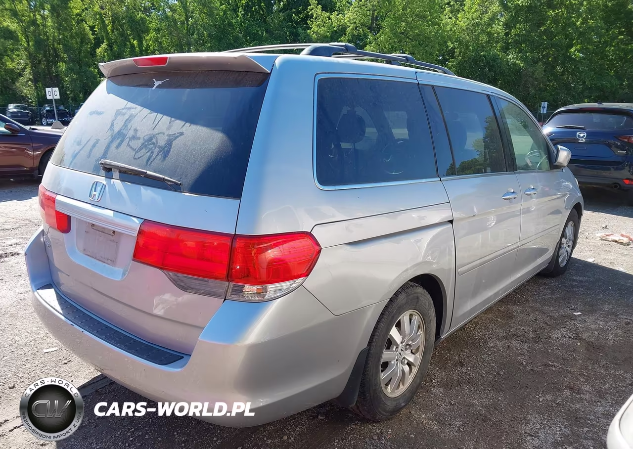 2010 Honda Odyssey Ex VIN:5FNRL3H49AB092428 - 4
