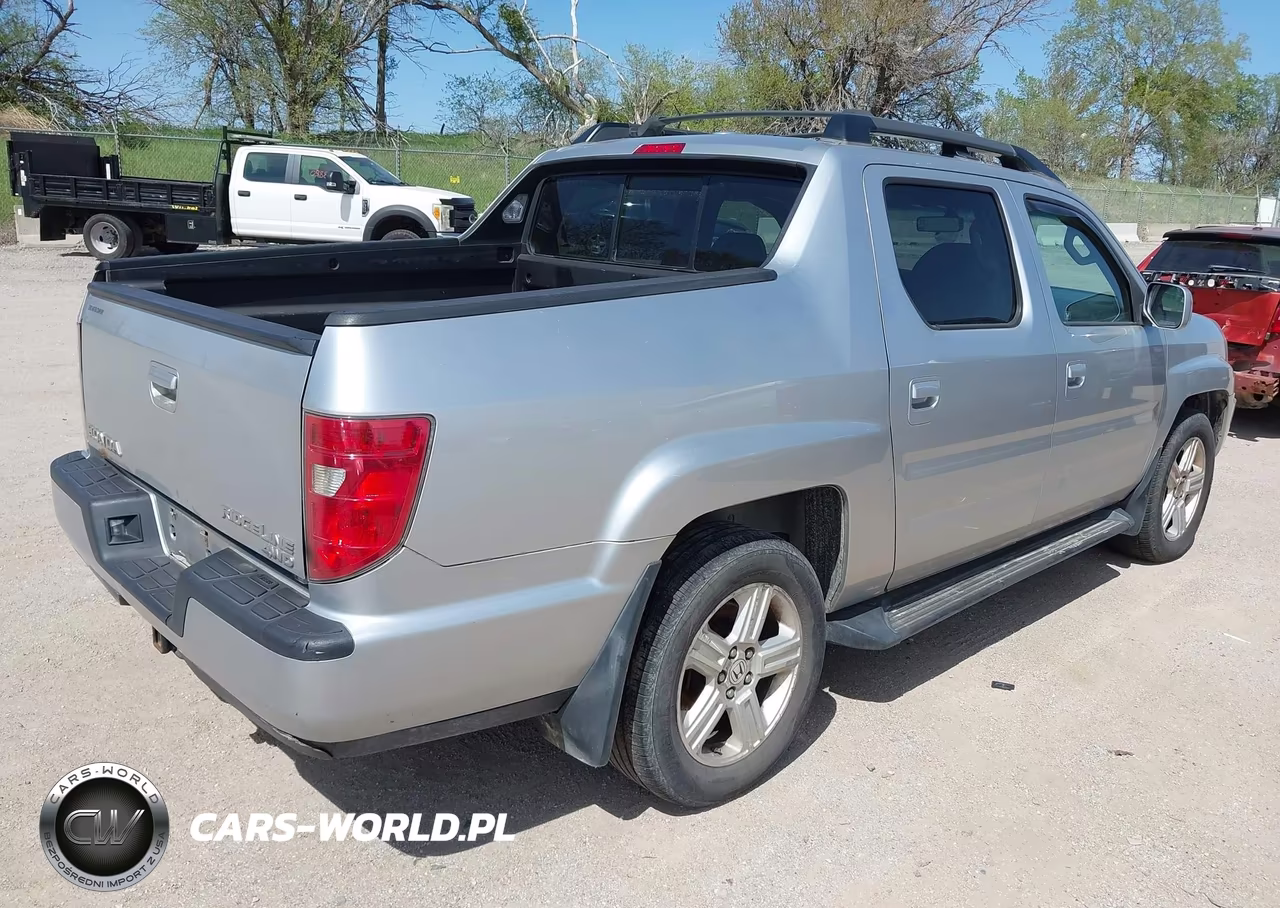 2011 Honda Ridgeline Rtl VIN:5FPYK1F51BB010635 - 4
