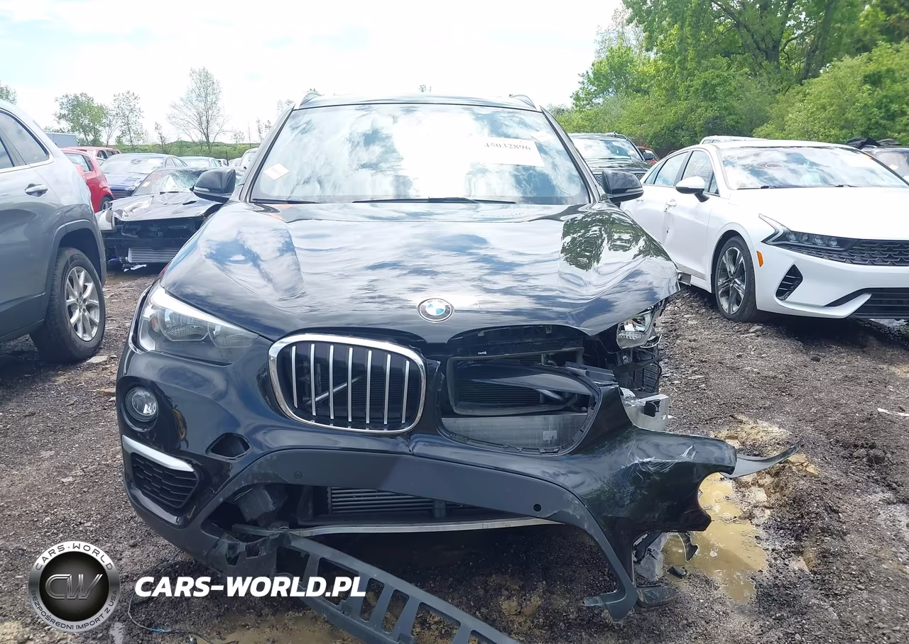 2018 BMW X1 xDrive28I VIN:WBXHT3C34J5L26666 - 12