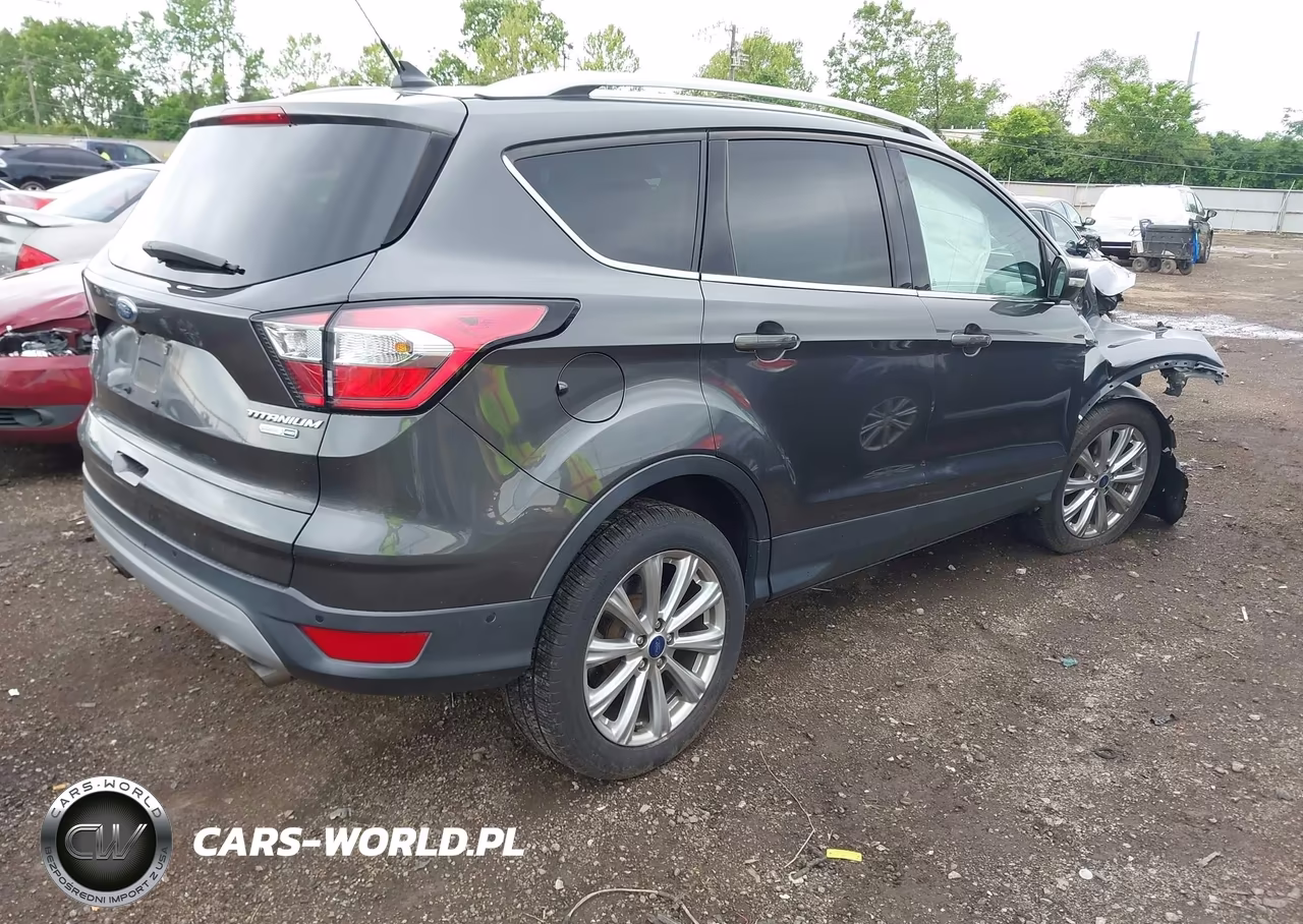 2018 Ford Escape Titanium VIN:1FMCU9J98JUB55758 - 4