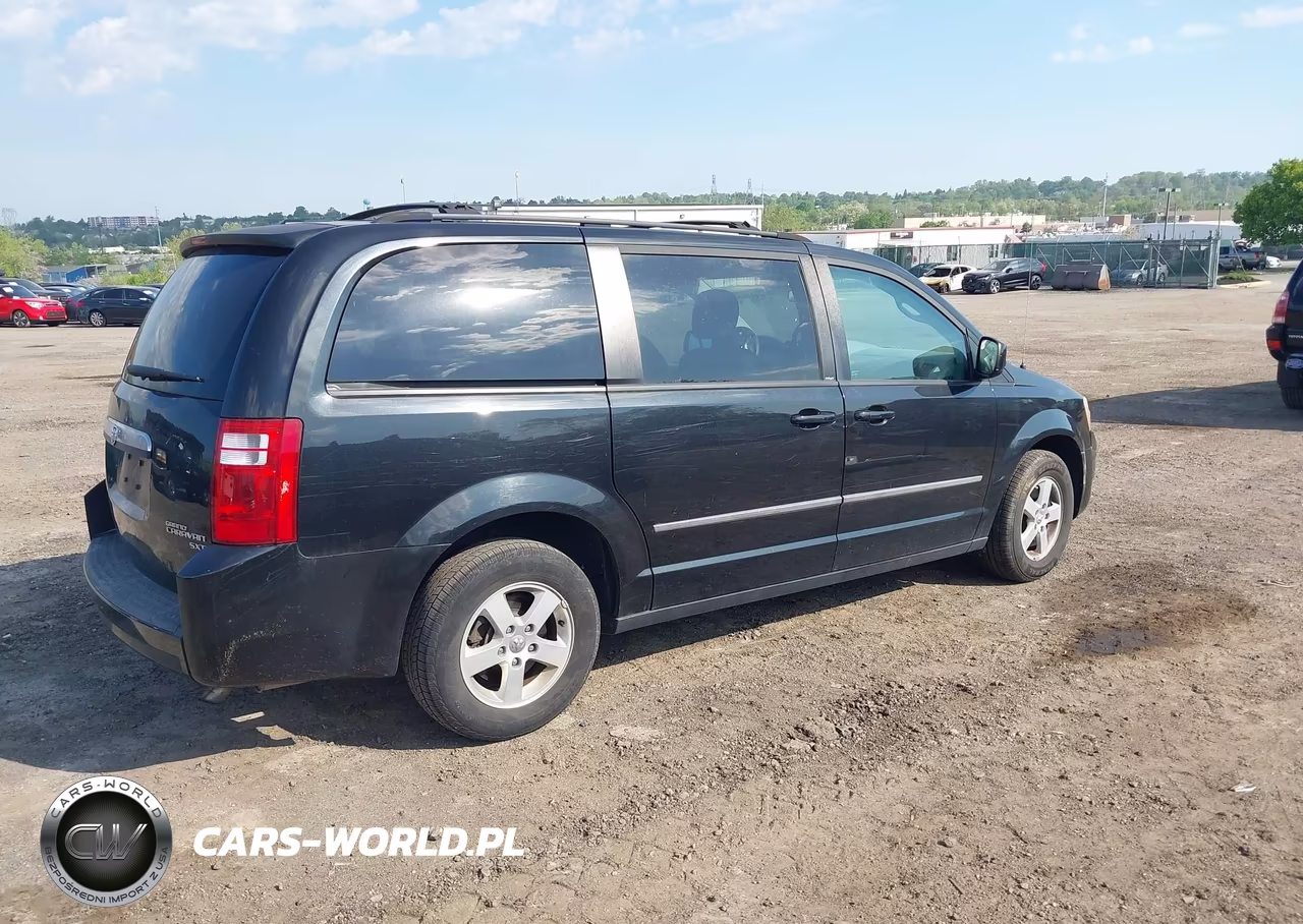 2010 Dodge Grand Caravan Sxt VIN:2D4RN5D11AR143249 - 4