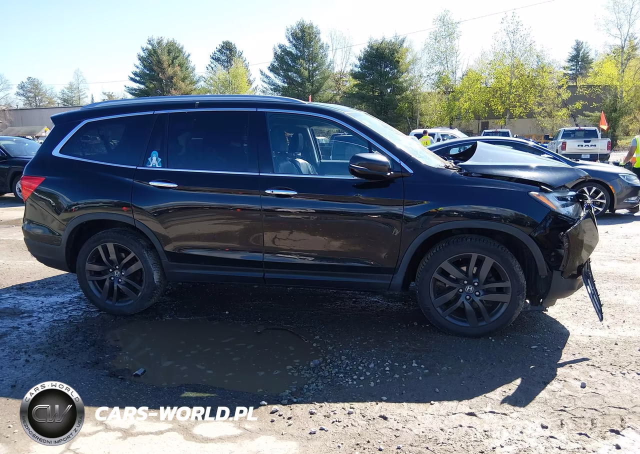 2018 Honda Pilot Elite VIN:5FNYF6H07JB009337 - 12