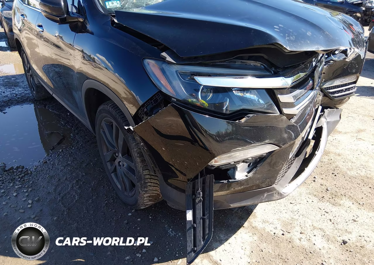 2018 Honda Pilot Elite VIN:5FNYF6H07JB009337 - 17
