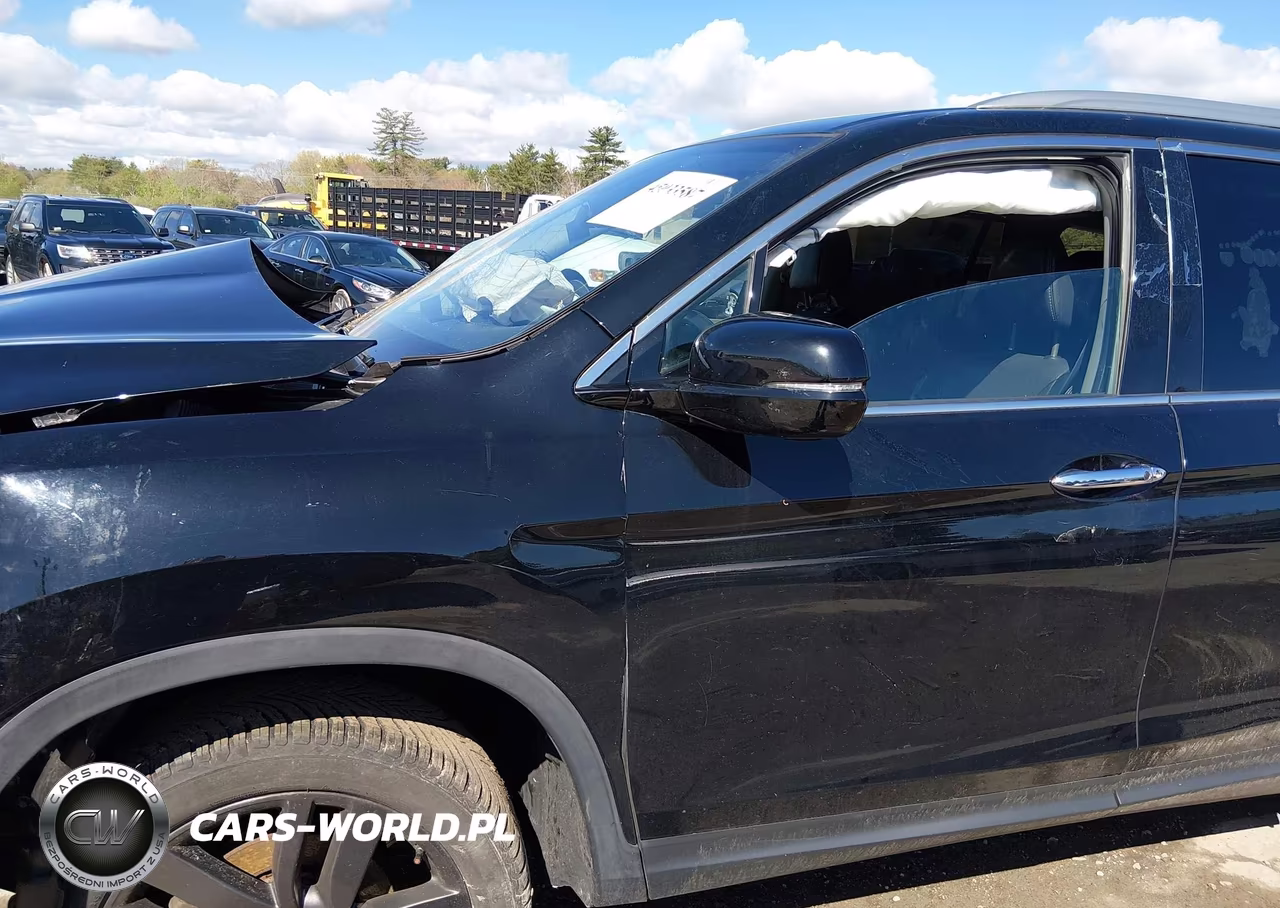 2018 Honda Pilot Elite VIN:5FNYF6H07JB009337 - 19