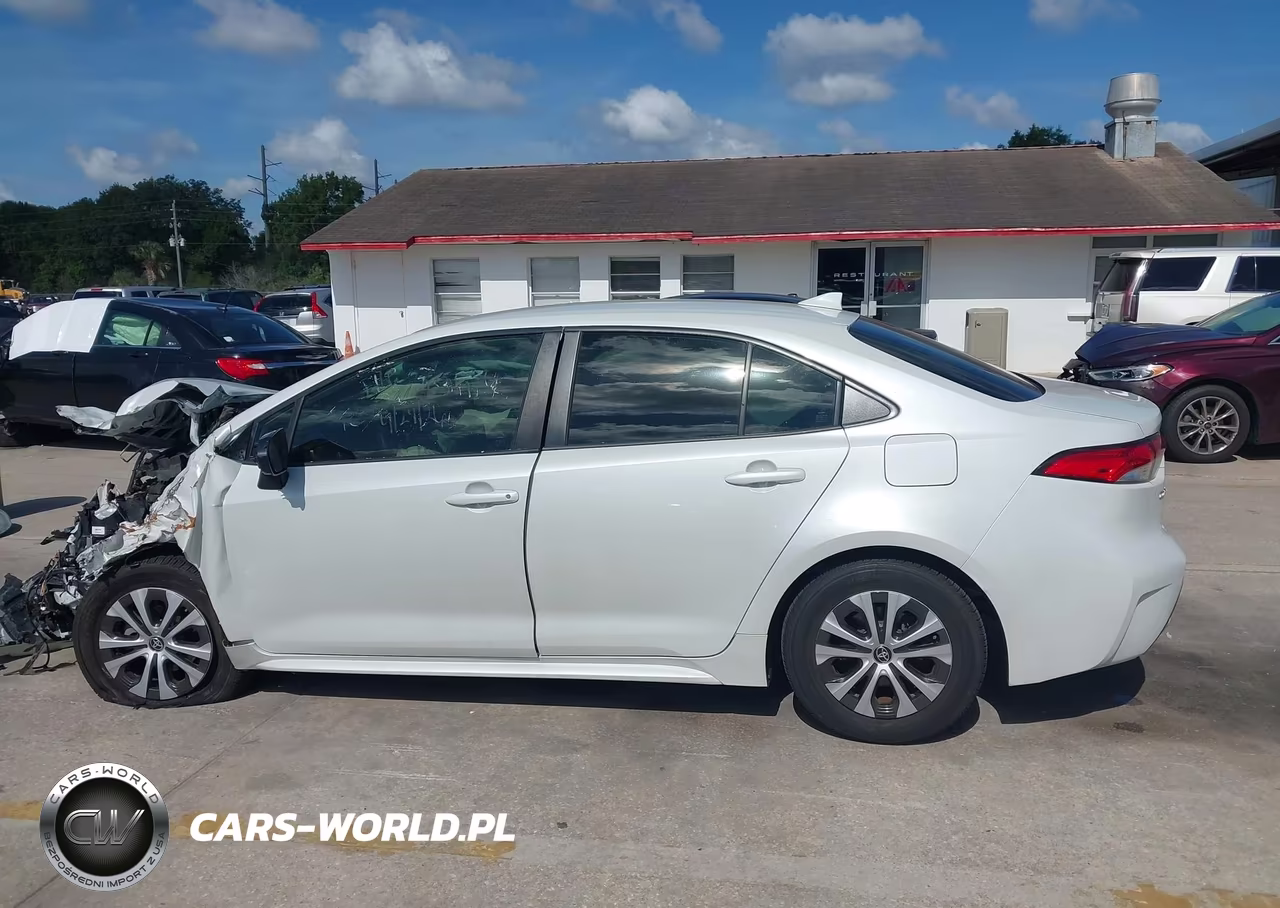 2022 Toyota Corolla Hybrid Le VIN:JTDEAMDE1N3010493 - 14