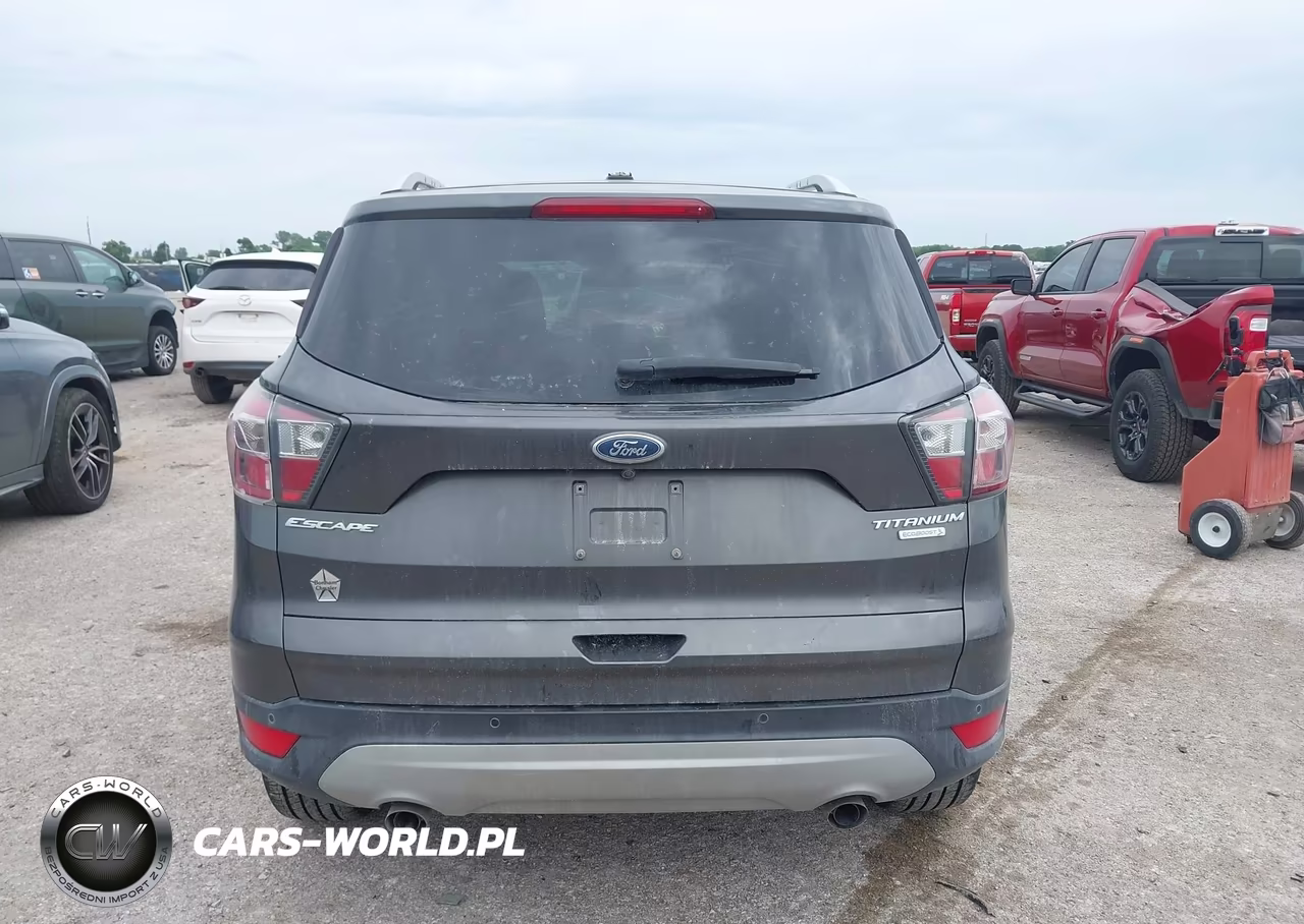 2017 Ford Escape Titanium VIN:1FMCU0J92HUA13329 - 16