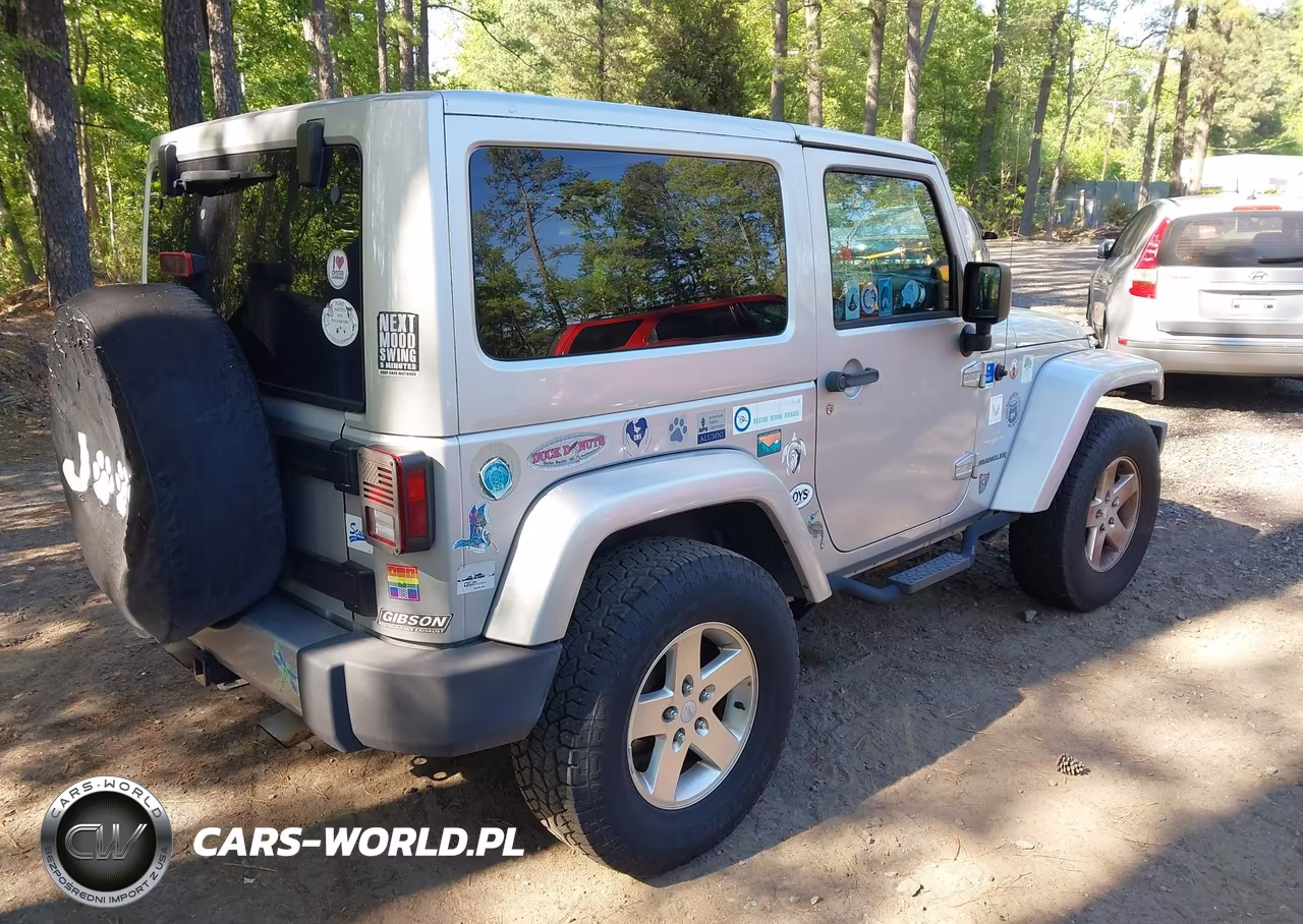 2012 Jeep Wrangler Sahara VIN:1C4GJWBG5CL283023 - 4