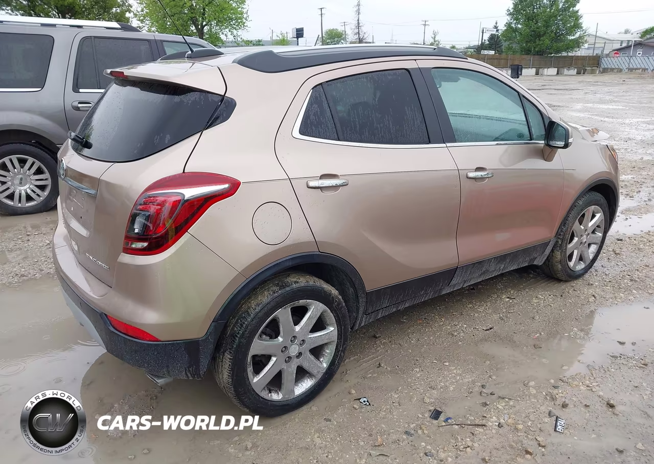 2018 Buick Encore Premium VIN:KL4CJDSBXJB617776 - 4