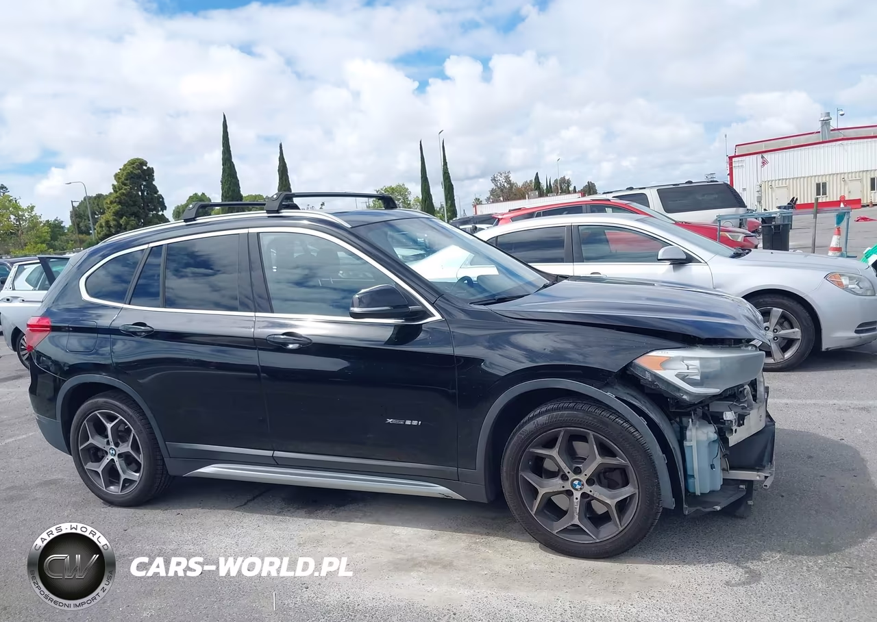 2018 BMW X1 xDrive28I VIN:WBXHT3C34J5K22016 - 13