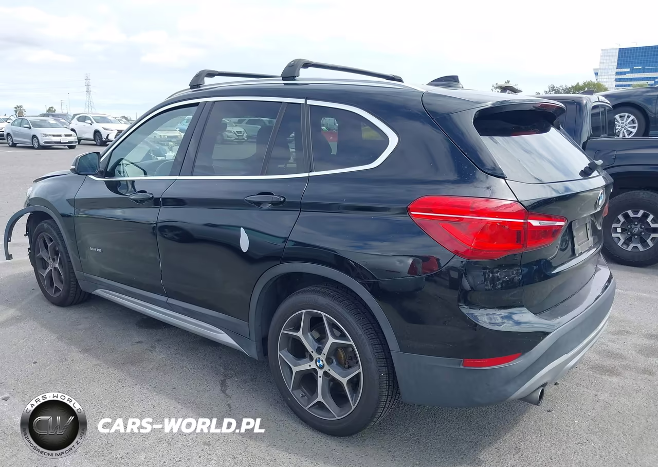 2018 BMW X1 xDrive28I VIN:WBXHT3C34J5K22016 - 3