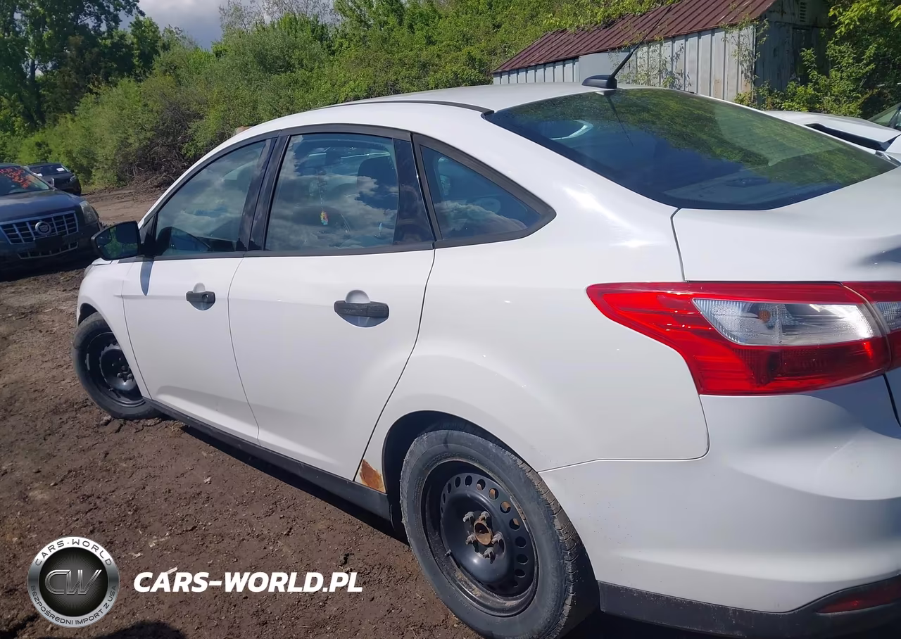 2014 Ford Focus S VIN:1FADP3E21EL388991 - 14
