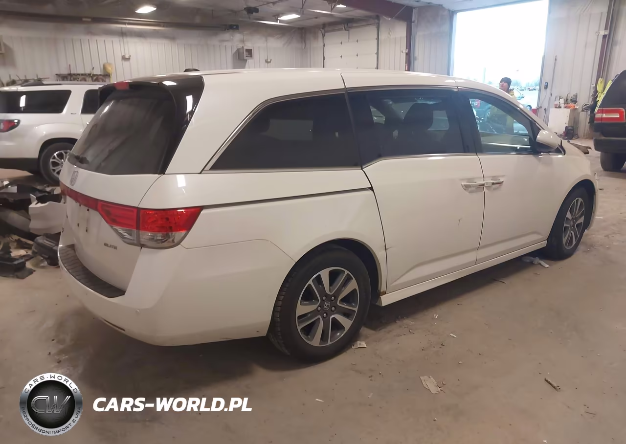 2014 Honda Odyssey Touring-Touring Elite VIN:5FNRL5H95EB101882 - 4