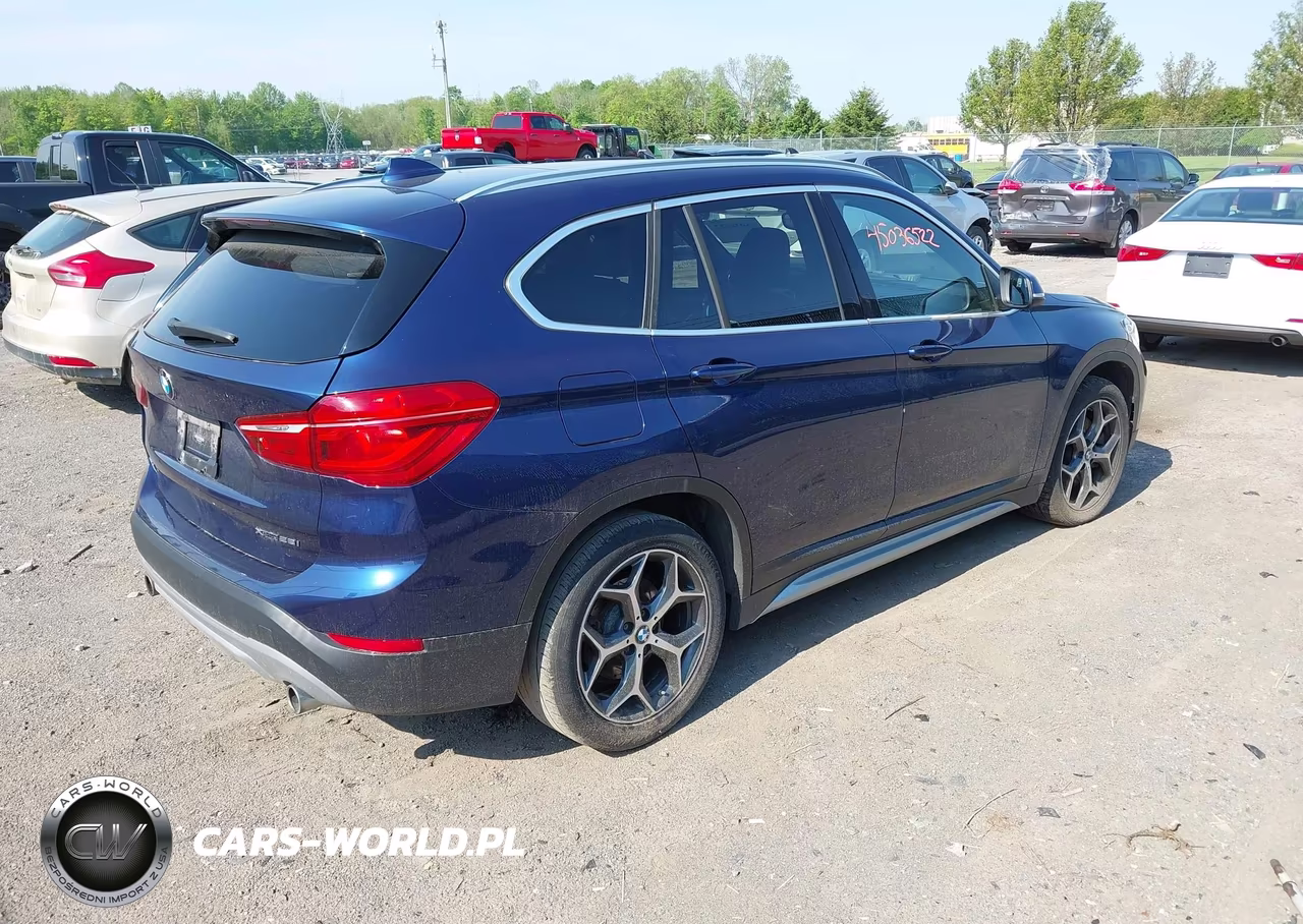 2018 BMW X1 xDrive28I VIN:WBXHT3C34J5L27977 - 4