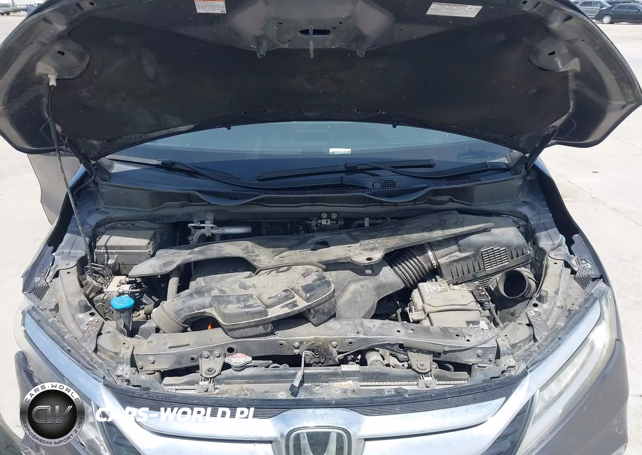 2018 Honda Odyssey Touring VIN:5FNRL6H8XJB031691 - 10