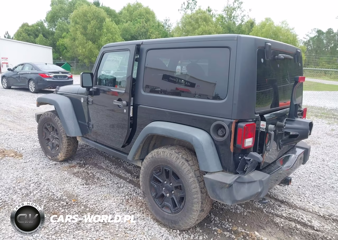 2015 Jeep Wrangler Willys Wheeler VIN:1C4AJWAG9FL506398 - 3