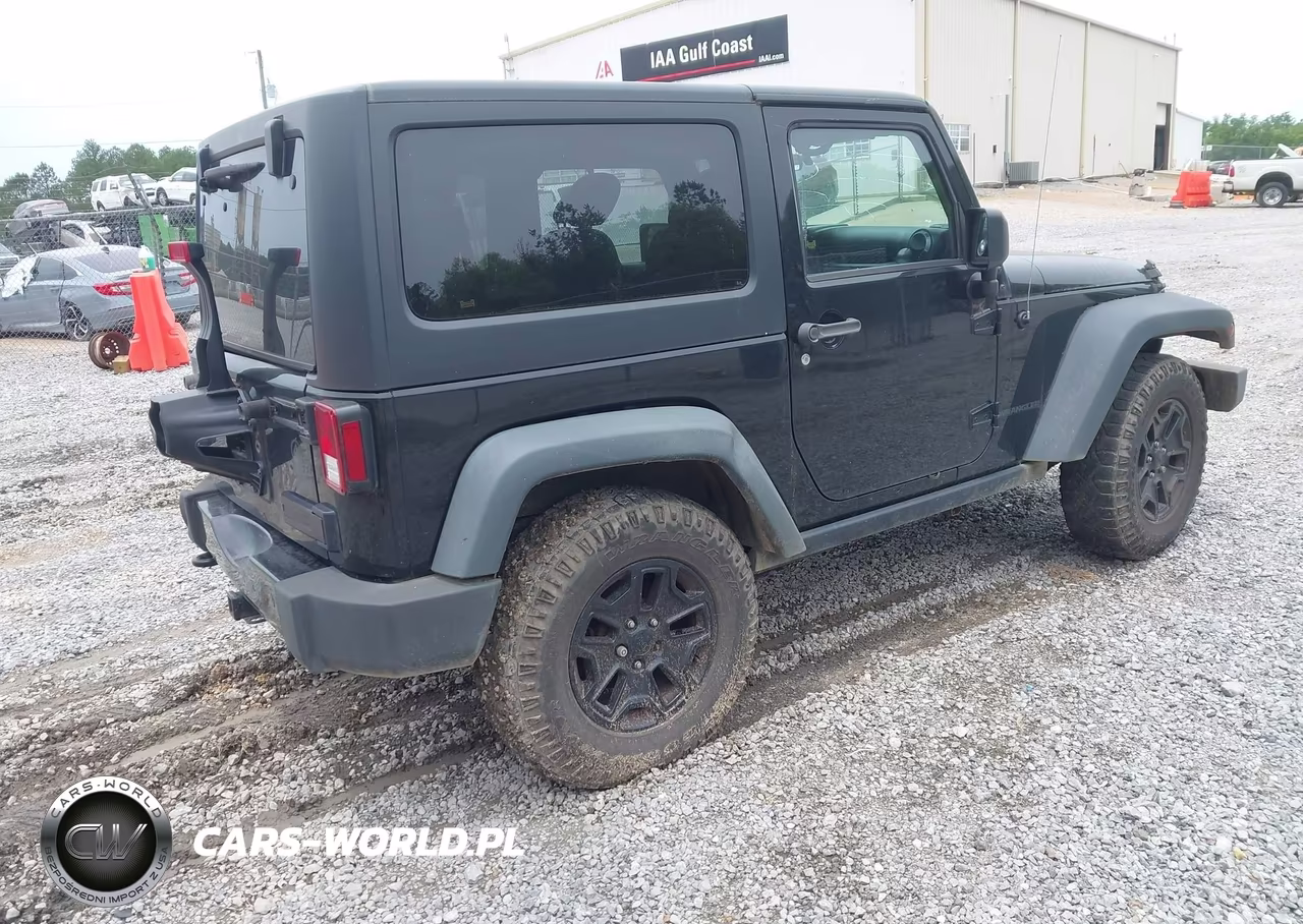 2015 Jeep Wrangler Willys Wheeler VIN:1C4AJWAG9FL506398 - 4