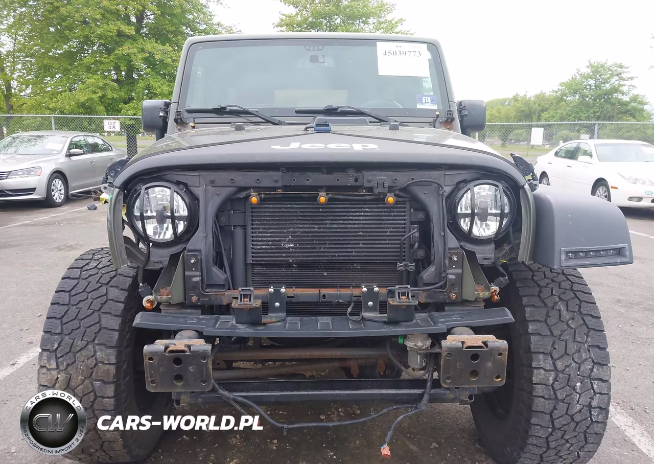 2015 Jeep Wrangler Unlimited Willys Wheeler VIN:1C4BJWDG2FL574445 - 12