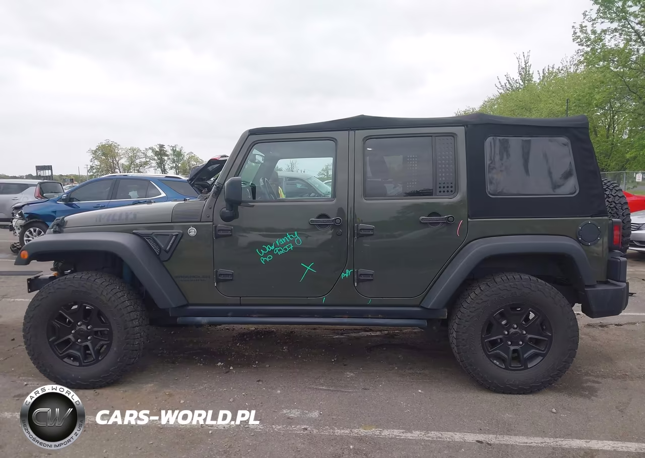 2015 Jeep Wrangler Unlimited Willys Wheeler VIN:1C4BJWDG2FL574445 - 14