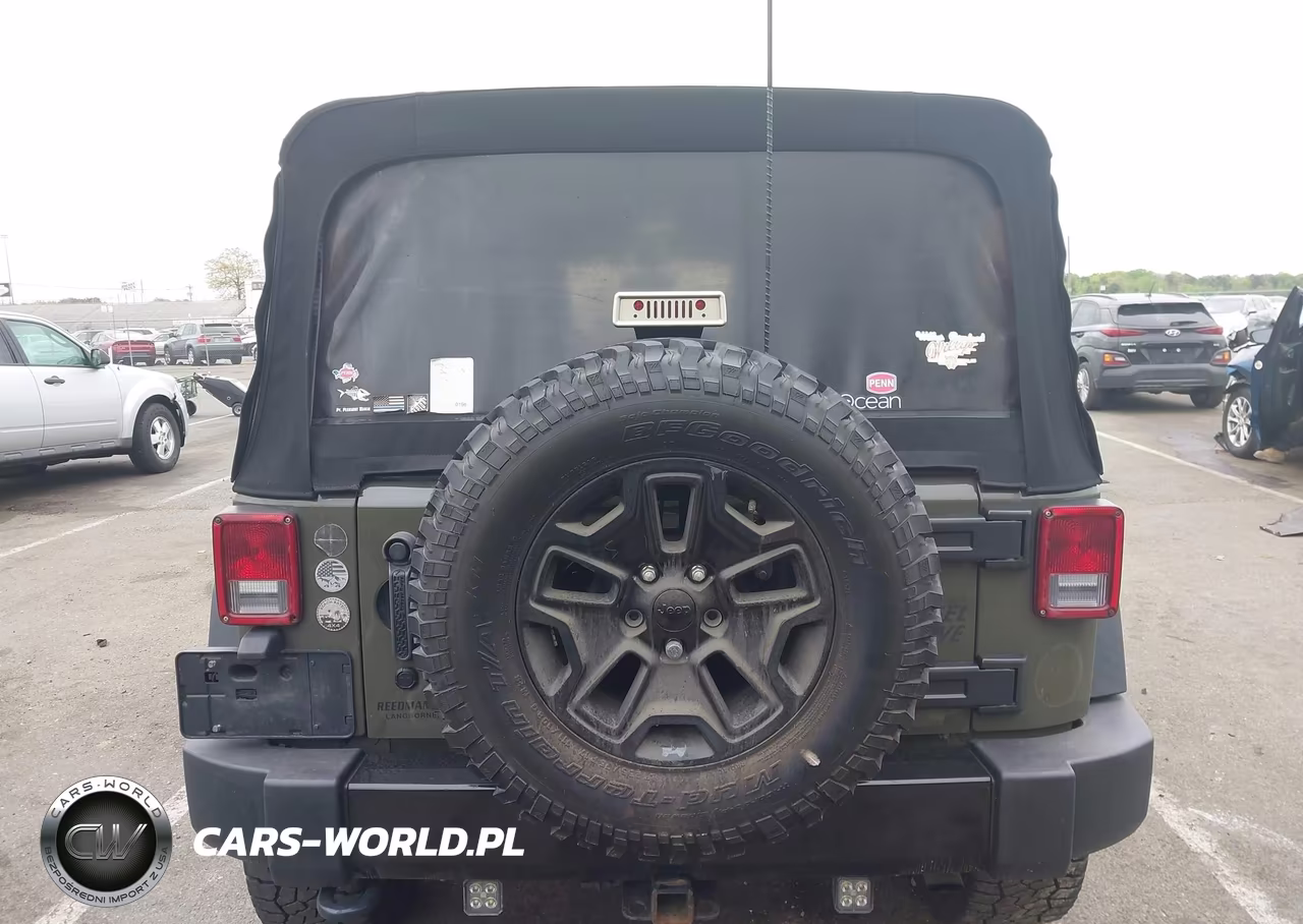 2015 Jeep Wrangler Unlimited Willys Wheeler VIN:1C4BJWDG2FL574445 - 16
