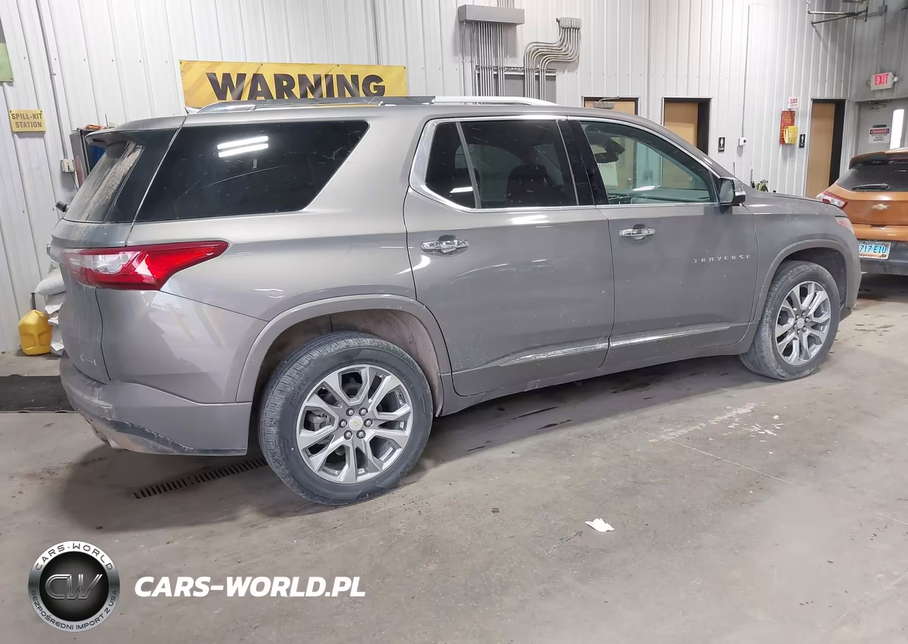 2018 Chevrolet Traverse Premier VIN:1GNEVJKW4JJ128582 - 4
