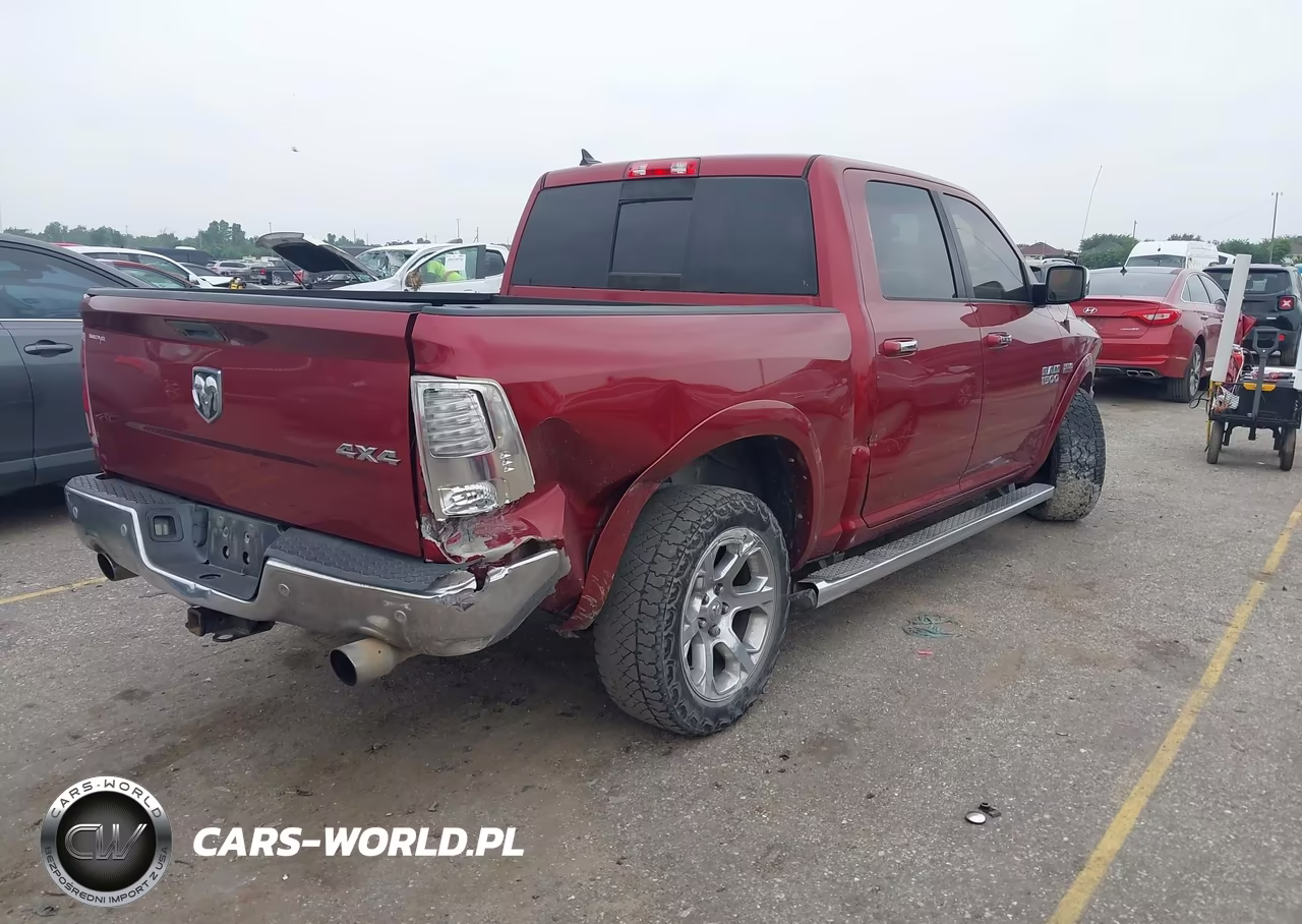 2015 Ram 1500 Laramie VIN:1C6RR7NT7FS777059 - 4