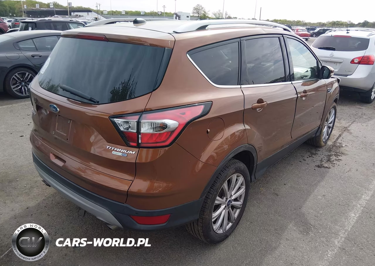 2017 Ford Escape Titanium VIN:1FMCU9J9XHUC41762 - 4