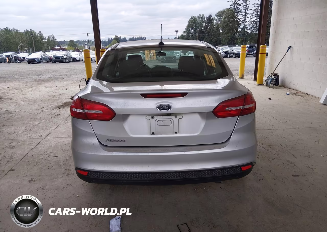 2015 Ford Focus S VIN:1FADP3E28FL281728 - 16