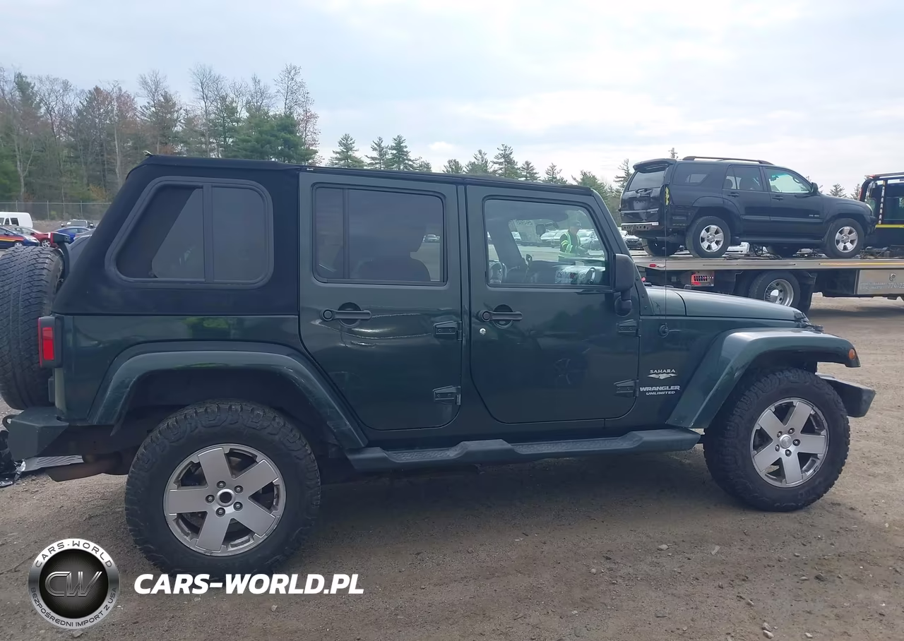 2011 Jeep Wrangler Unlimited Sahara VIN:1J4BA5H10BL563853 - 13