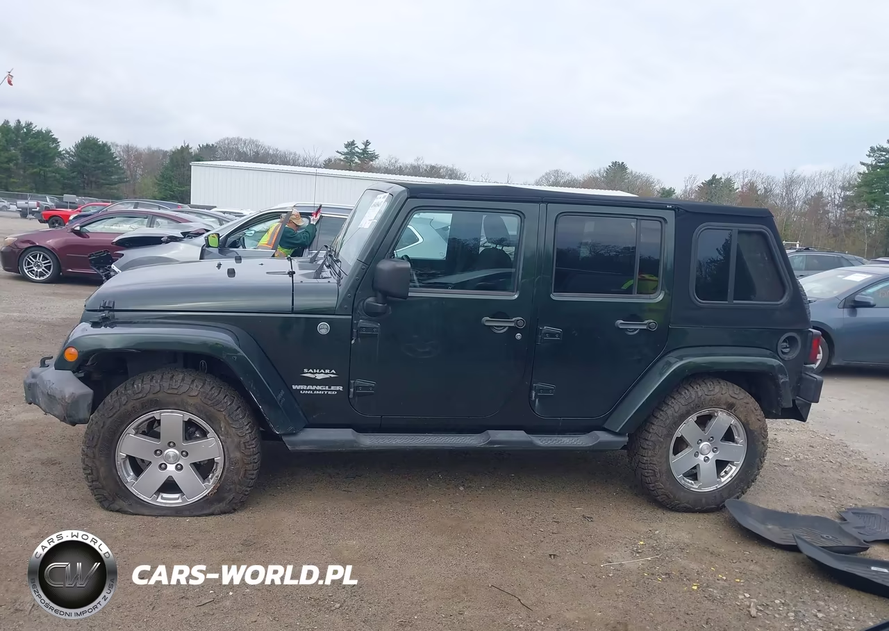 2011 Jeep Wrangler Unlimited Sahara VIN:1J4BA5H10BL563853 - 14