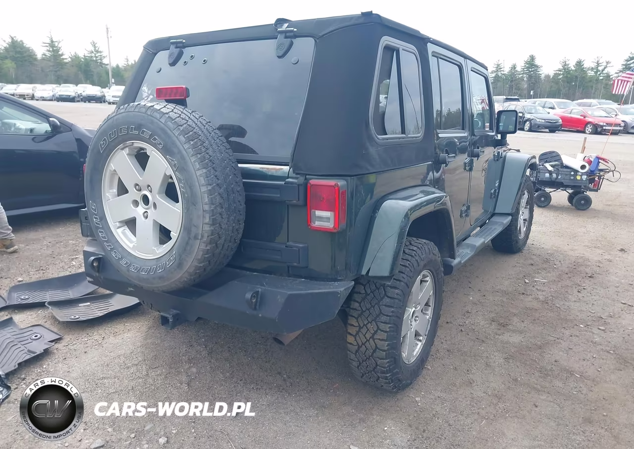 2011 Jeep Wrangler Unlimited Sahara VIN:1J4BA5H10BL563853 - 4