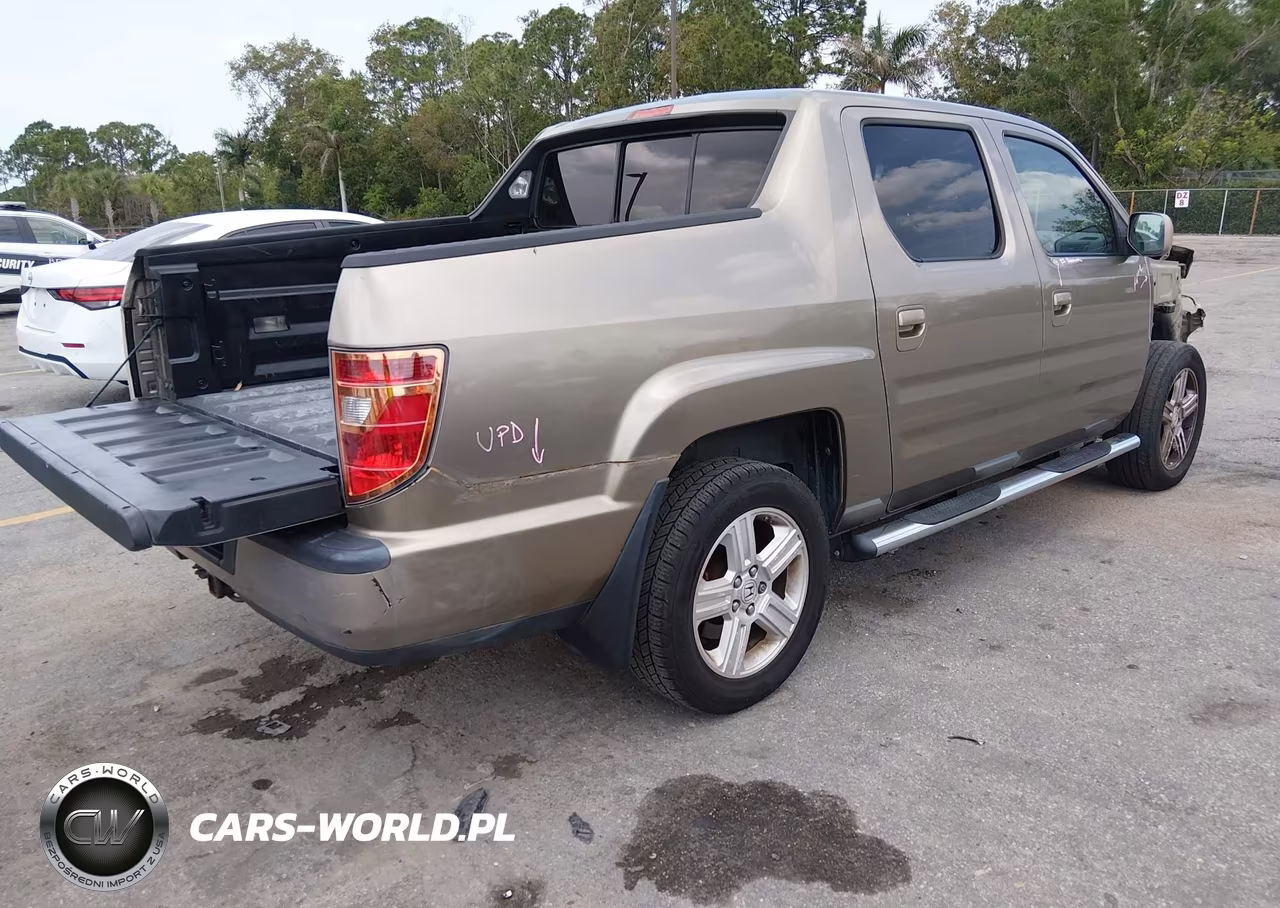 2011 Honda Ridgeline Rtl VIN:5FPYK1F51BB009985 - 4