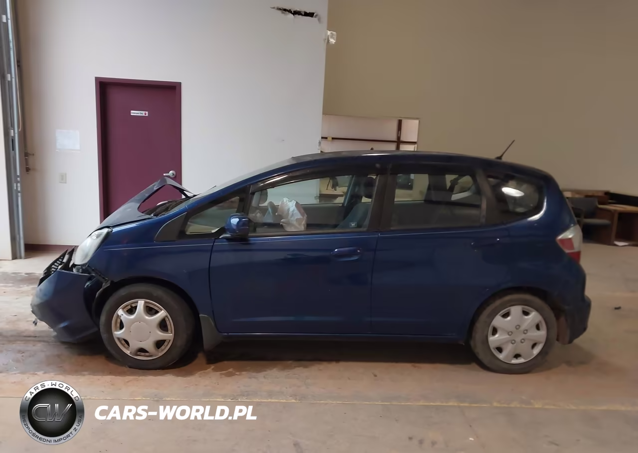 2013 Honda Fit VIN:JHMGE8H33DC055686 - 14