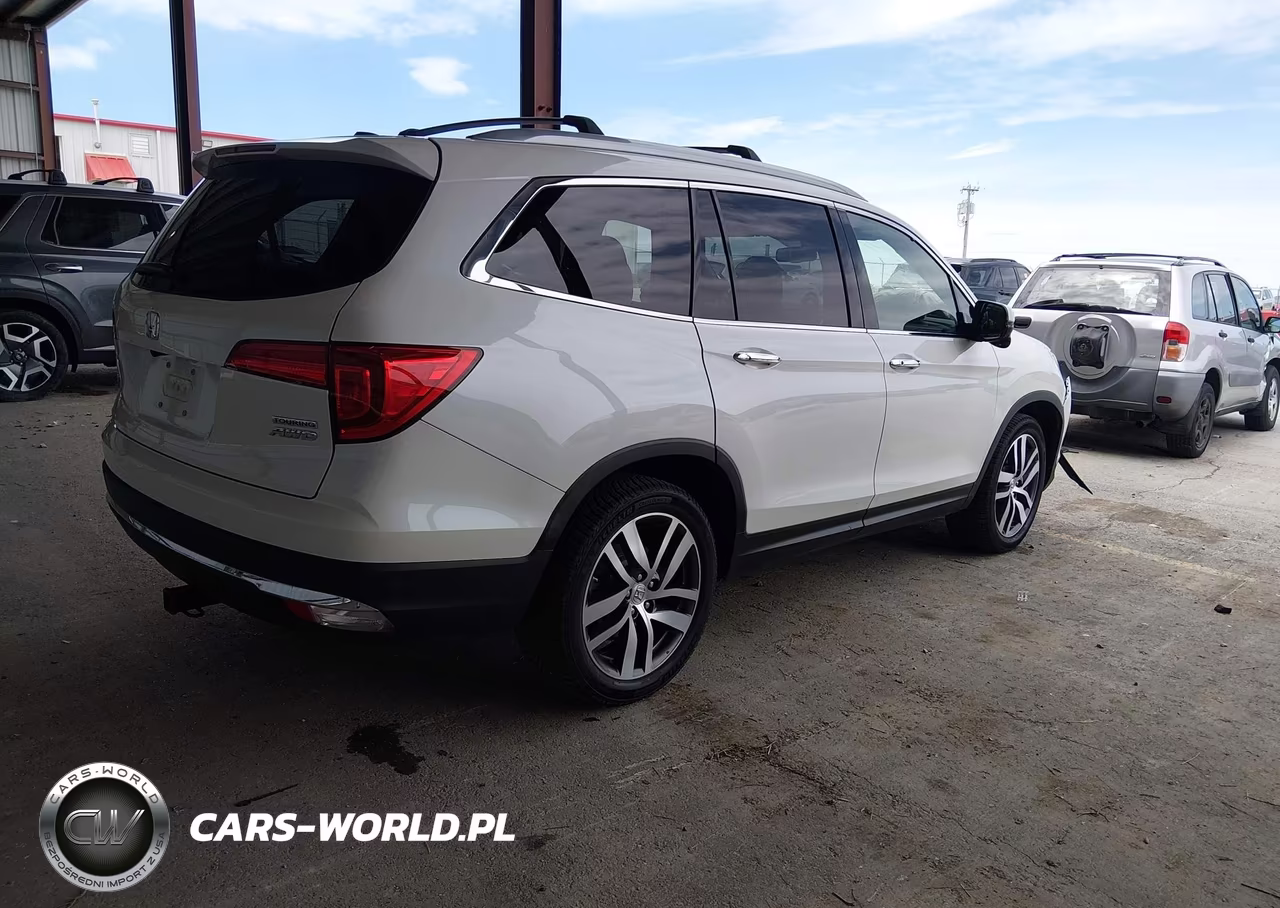 2016 Honda Pilot Touring VIN:5FNYF6H97GB101135 - 4