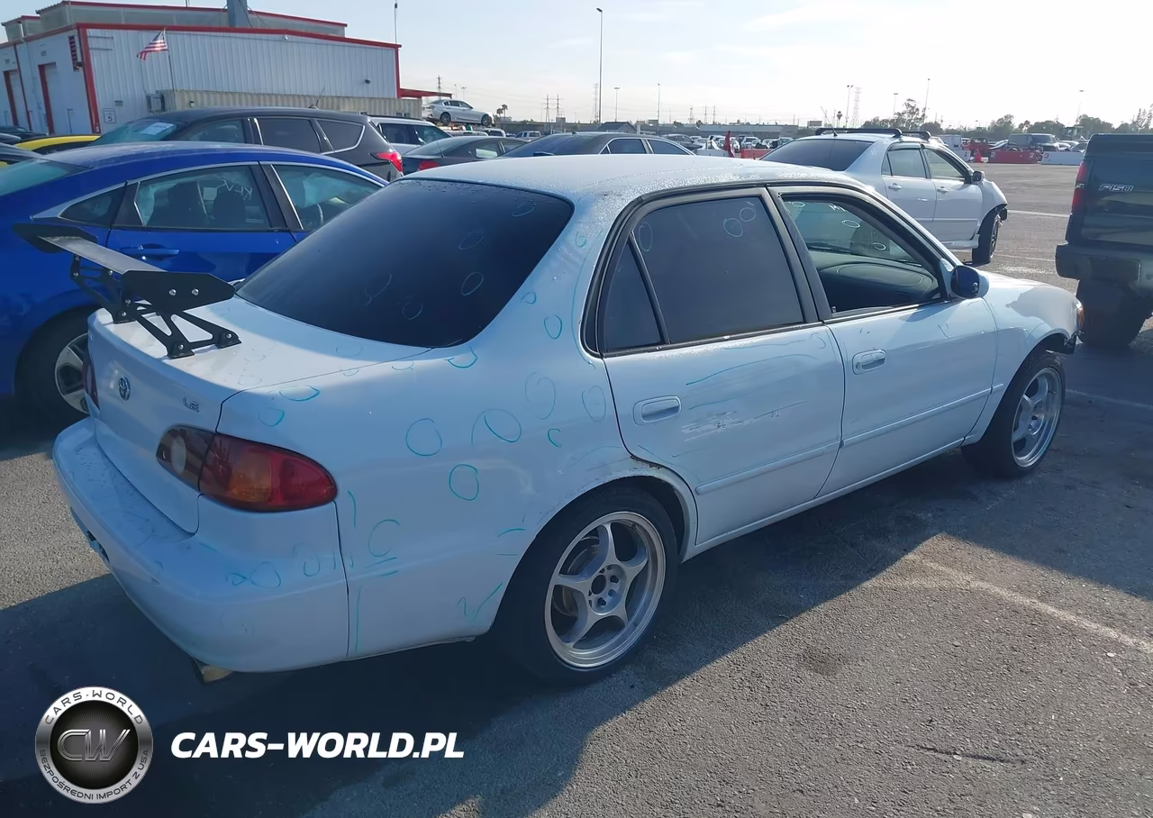 2001 Toyota Corolla Le VIN:1NXBR12E21Z495837 - 4