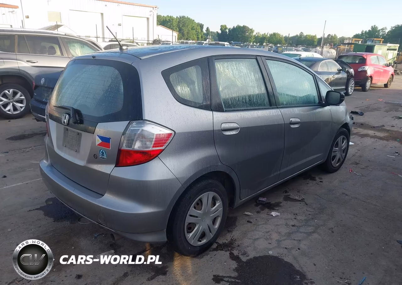 2010 Honda Fit VIN:JHMGE8G22AC035384 - 4