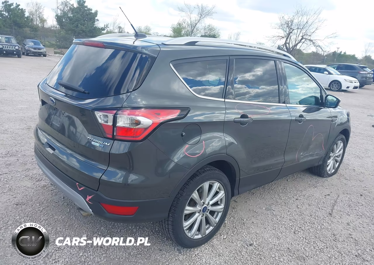 2017 Ford Escape Titanium VIN:1FMCU9JD7HUE21253 - 4