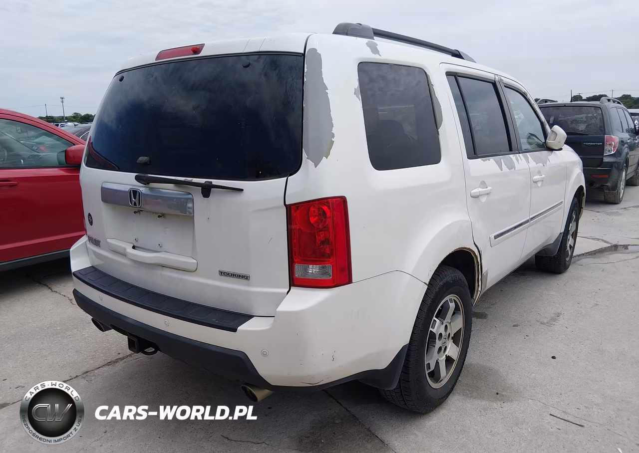 2011 Honda Pilot Touring VIN:5FNYF3H9XBB025711 - 4
